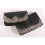 Silver-mounted black seal leather purse by Tiffany & Co., the flap applied with silver daisies