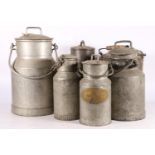 Six galvanized milk churns of varying sizes, largest 45cm high.