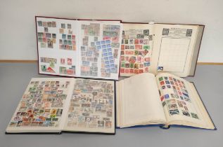 Europe & World. Four well filled collector's stamp albums with issues from Spain, Ireland, Cyprus