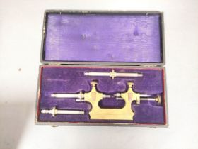 Late 19th century watchmaker's Jacot tool in leather hard case.