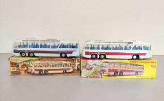 Dinky Toys. Two boxed Vega Major Luxury Coaches No. 952 with white body and blue seat interior. (2)