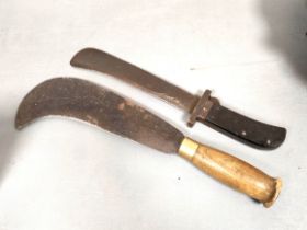 WW2. USAF folding survival machete and a British military billhook dated 1942. (2)