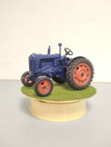 Vintage die-cast Chad Valley Fordson Major Tractor no 9235 with turntable display stand.