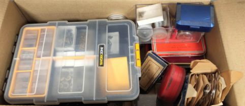 Box of watchmaker's parts to include mainsprings, buttons, balance staffs, screws and dials.