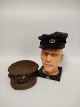 Two military soft caps to include a WW2 era RAF cap and a khaki cap bearing W.R.A.C badge. (2)