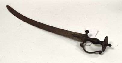 19th century Indian Talwar curved sabre the blade measuring 75cm. Traces of gilt to disc pommel.