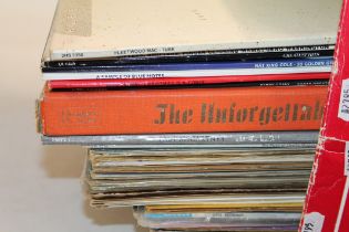 Two boxes of mixed records to include Paul Simon, Fleetwood Mac, Queen, Elton John, etc (over 60)