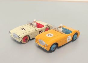 Dinky. 109 Austin Healey racecars to include a '100' Sports, yellow/blue interior, blue hubs, racing