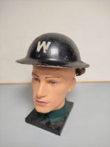 WW2. Home Front Air Raid Wardens brodie helmet in black paint finish with applied white W.