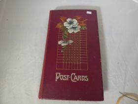 Postcards.  Early 20th cent. folio album of old postcards, UK topography, sentimental, greetings,