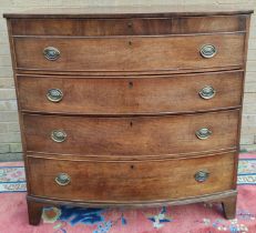 Early 19th century mahogany bow front chest of  four graduated drawers on bracket feet.  110cm high,