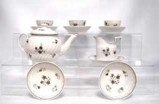 Late 18th century English porcelain part teaset decorated with monochrome flowers and Greek key