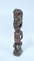 South Pacific carved Maori totem figure of Tiki circa 1960s, with allover incised decoration, mother