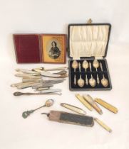 Set of six silver teaspoons cased, another enamelled, various fruit and penknives, some with