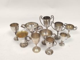 Eight silver trophy cups including one Chinese and two others, epns. The silver 474g (10)