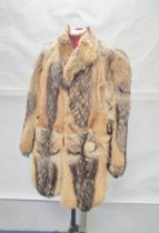 Lady's vintage mottled dark brown, red and white fur coat, possibly coyote or marbled fox, no