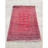 Antique Turkoman hand knotted rug with seven rows of two geometric medallion to the centre, with