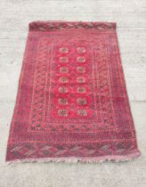 Antique Turkoman hand knotted rug with seven rows of two geometric medallion to the centre, with