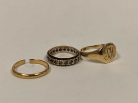 9ct gold signet ring, another cut and an eternity ring. 9g gross.