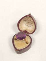 Amethyst ring in gold, '18ct' Size 'K', 7g gross.