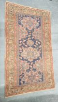 Antique Kurdistan / Turkish hand knotted rug with geometric medallions to the centre with further