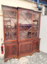 Attractive Georgian style mahogany breakfront library bookcase with dentil cornice and reeded