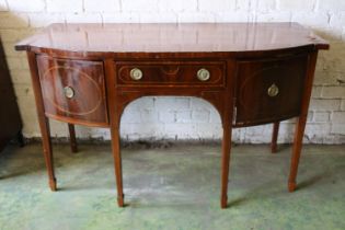 19th century mahogany and satinwood crossbanded bowfront sideboard, three frieze drawers, on boxwood