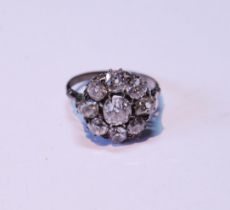 Early 20th century diamond cluster ring with old-cut brilliant, approximately .5ct, surrounded by