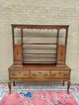 Georgian style oak dresser. upper section with shaped apron above open delft shelving flanked with