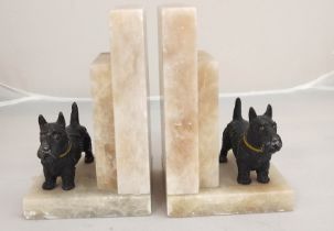 Pair of Art Deco alabaster book ends with cold painted spelter Scottish Terrier figures.18 cm high.