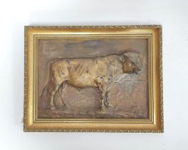 Continental cast bronze plaque in the form of a bull in relief in naturalistic setting, signed