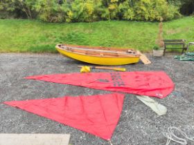 Vintage 16' Mirror type sailing dinghy of leaf form and of marine ply and teak construction. With
