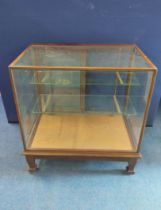 Vintage mahogany glazed shop cabinet of square size, sliding doors to the reverse, glazed allover