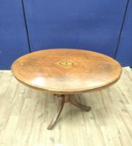 19th century walnut centre table with marquetry inlaid panel to the oval top, on turned column and