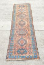 Antique Kurdistan / Turkish hand knotted runner with assorted geometric medallions to the centre