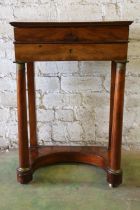 19th century mahogany work table in the Empire style, the rectangular top above frieze drawer,