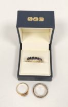 Gold ring with black diamonds and two others, all 9ct.