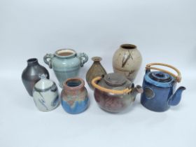 Collection of studio pottery to include tea pots, glazed vases, some examples with impressed