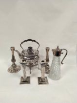 Two pairs of e.p. table candlesticks and similarly mounted claret jug, & a tea kettle.