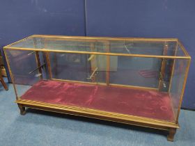 Vintage mahogany glazed shop cabinet with opening to the reverse, glazed allover, metal shelve