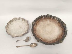 Pair of e.p waiters of Georgian style in sizes, and a silver spoon and ladle. (4)