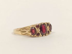 Garnet three stone ring in 9ct gold and another with garnets. Sizes 'Q' 3.3g