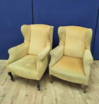 Pair of early 20th century wing back armchairs upholstered in later mustard colour velour, On