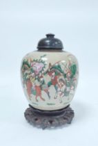 Chinese crackle glaze ginger jar of ovoid form with later hardwood cover, oxidised banding to the