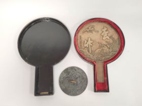 Japanese bronze hand mirror decorated with cranes and calligraphic character marks, 20cm diameter