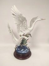 Lladro figure group "Take Flight" the large group modelled as a swan in flight above a smaller swan,