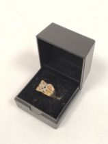 Diamond cluster ring on broad split shank mount. 9ct gold. 3.7g Size 'N'