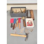 Bookbinding tools to include typeset holder, gilding spatula, doming hammer, Arkansas stone.