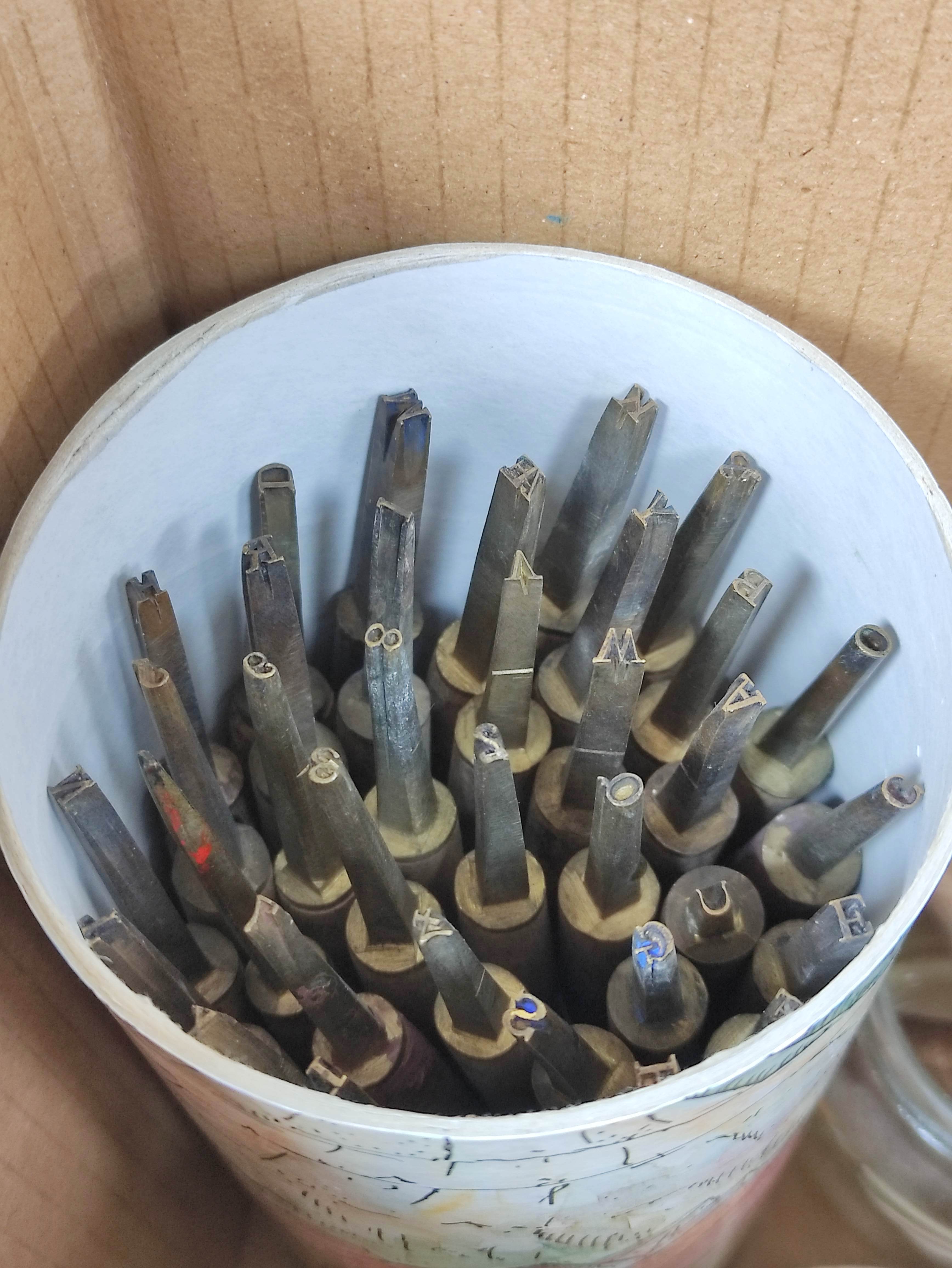 Box of bookbinding equipment to include letter and number stamps, brass gouges. - Image 2 of 7