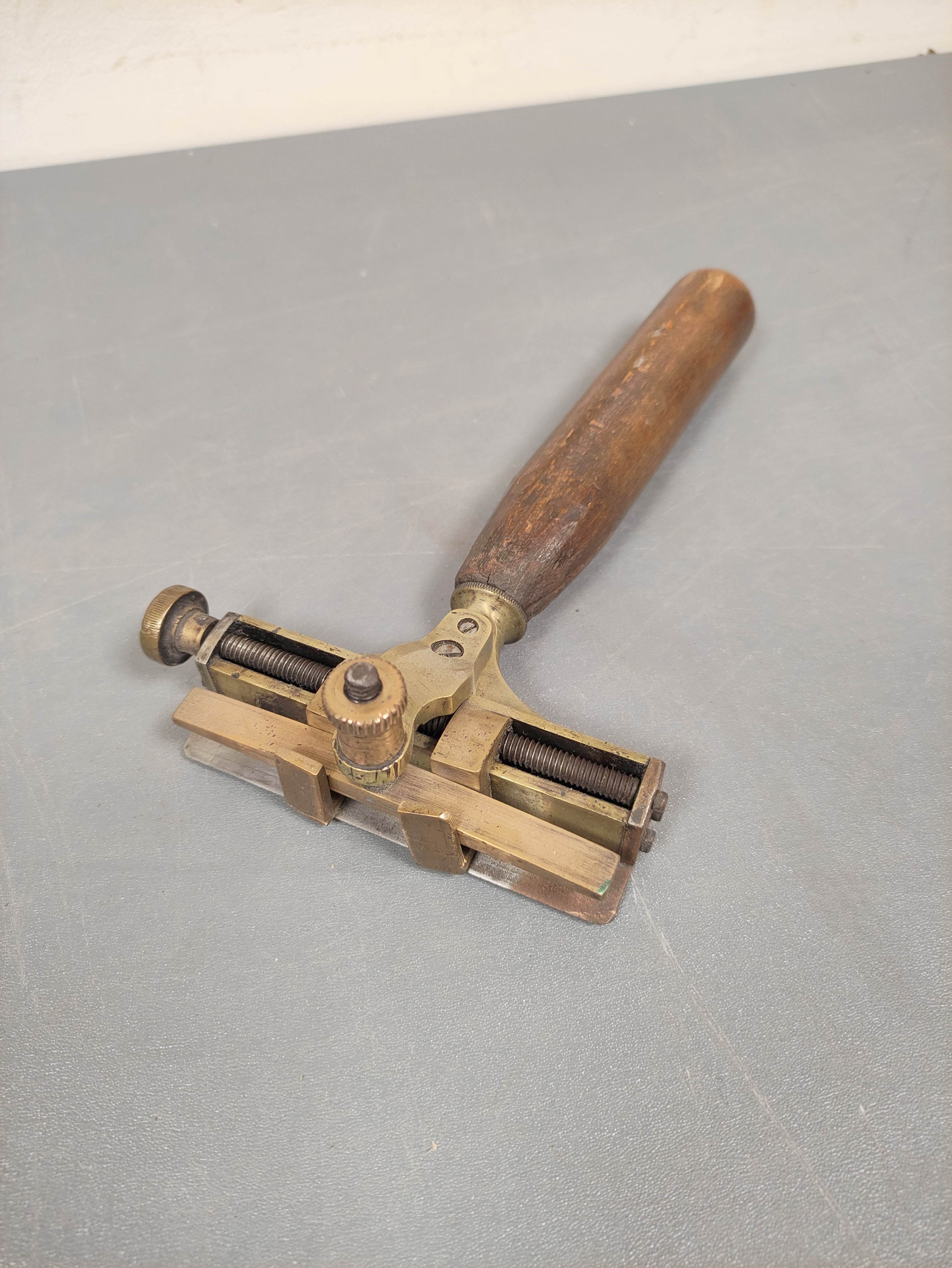 Bookbinding tools to include typeset holder, gilding spatula, doming hammer, Arkansas stone. - Image 5 of 7